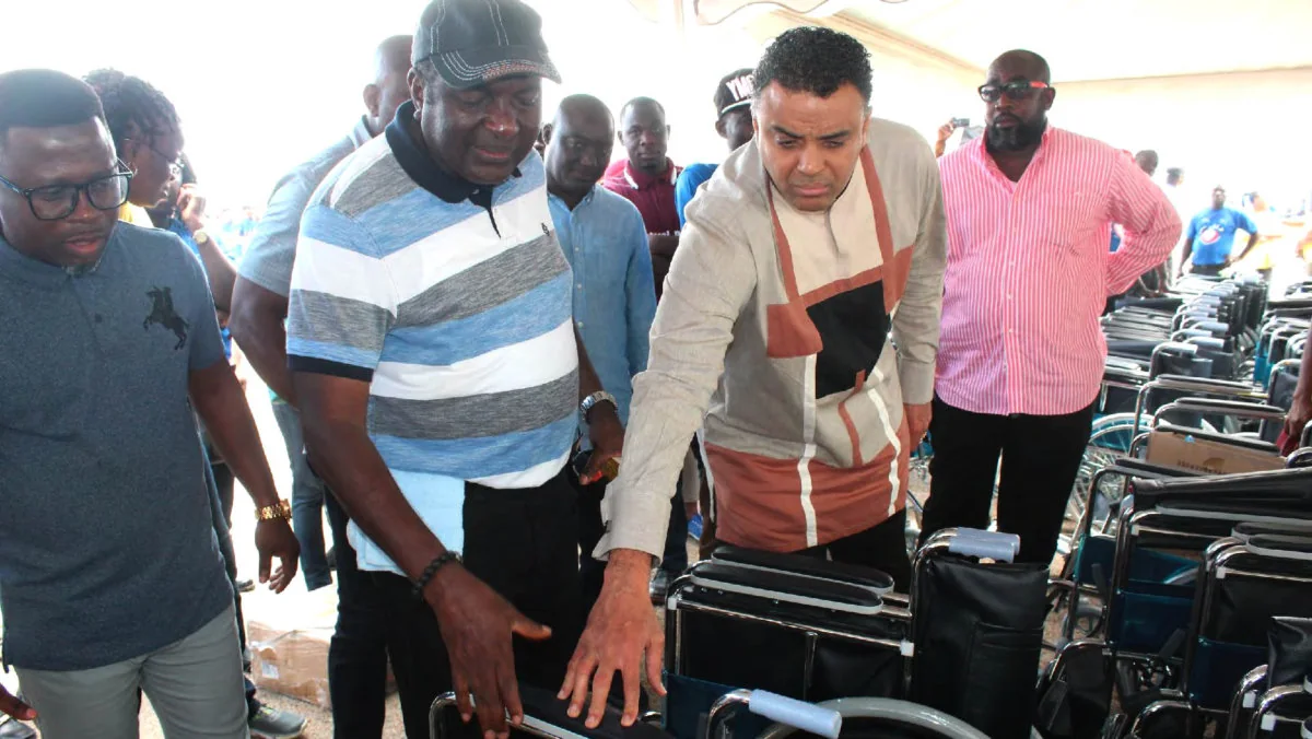 Bishop Dag Heward-Mills inspecting a hall full of new wheelchairs.