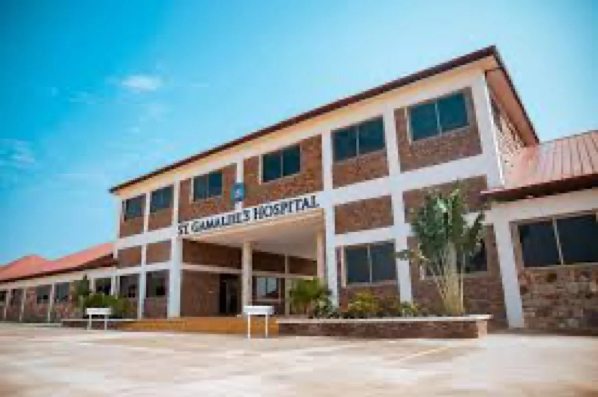 The front of St. Gamaliel’s Hospital, with its name on the building.
